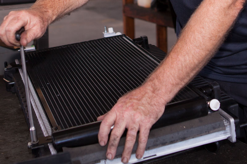 Brad working on a radiator